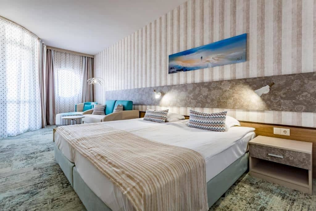 rooms-standard-juniorsuite-lateralseaview-balcony-or-terrace