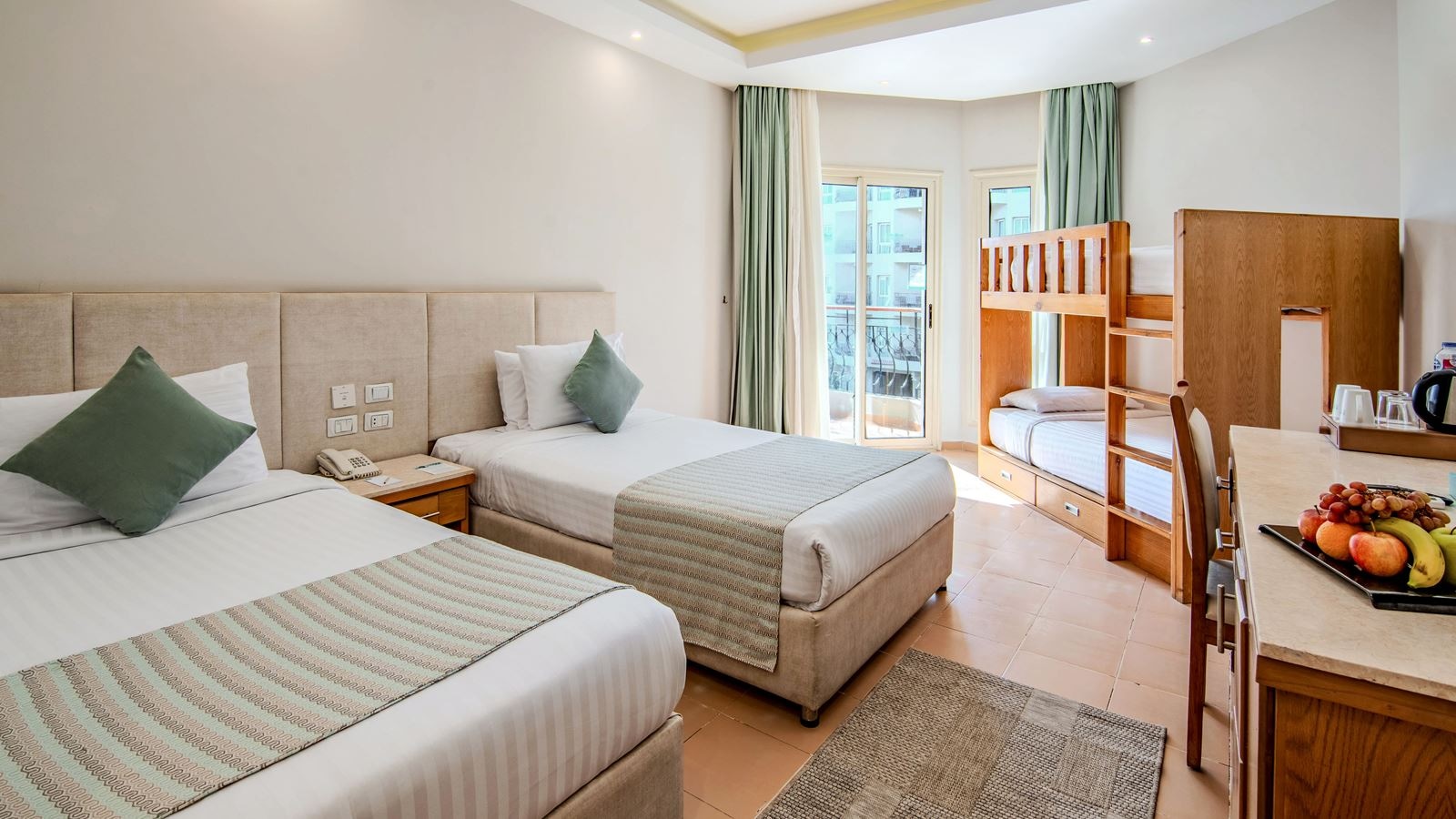 rooms-family-bunkbed-room-side-seabackgarden-view