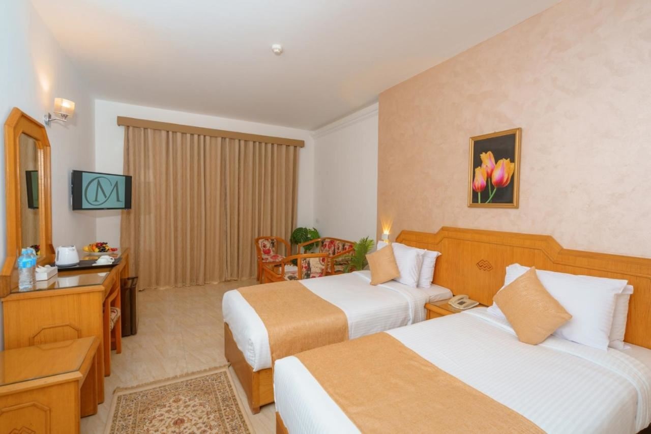 rooms-superior-sea-and-pool-view-room