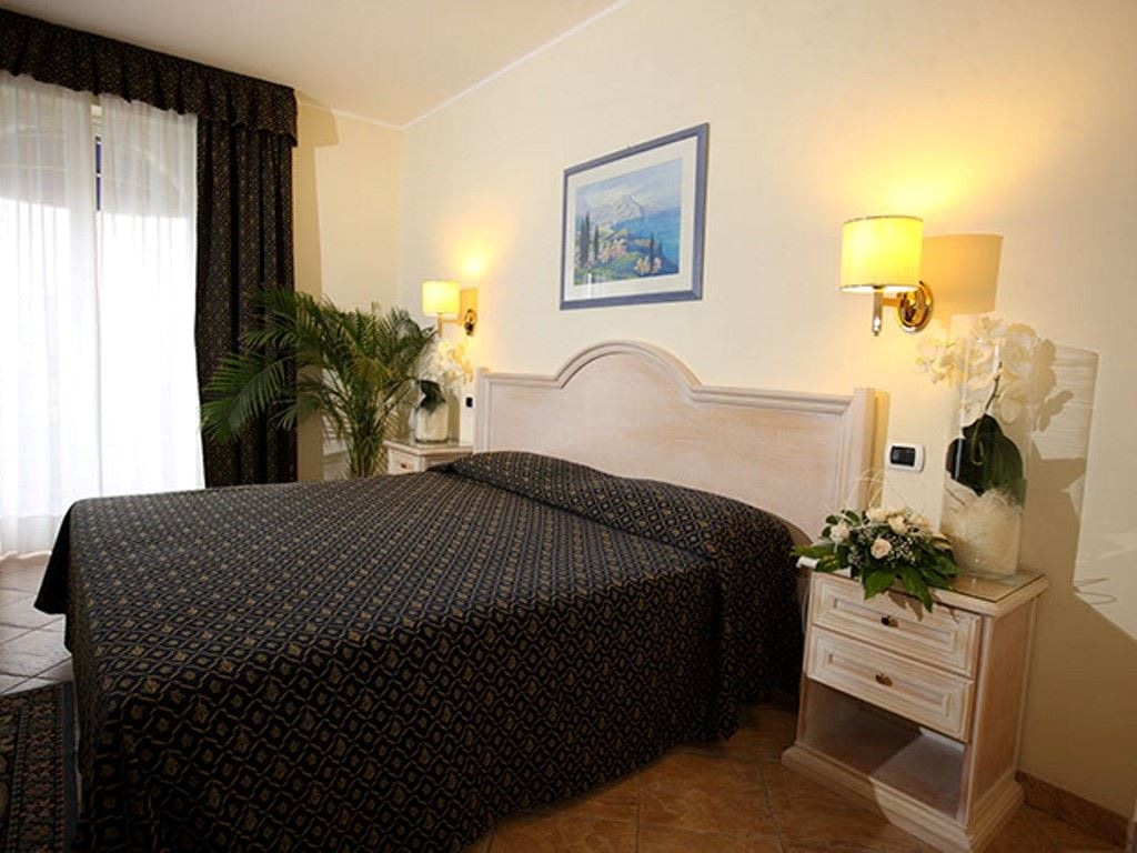 rooms-economy-room-ground-floor--with-balcony-or-terrace