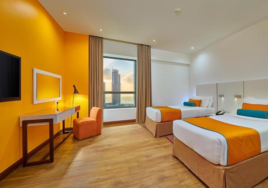 rooms-2bedroom-suite-balcony-partial-sea-view