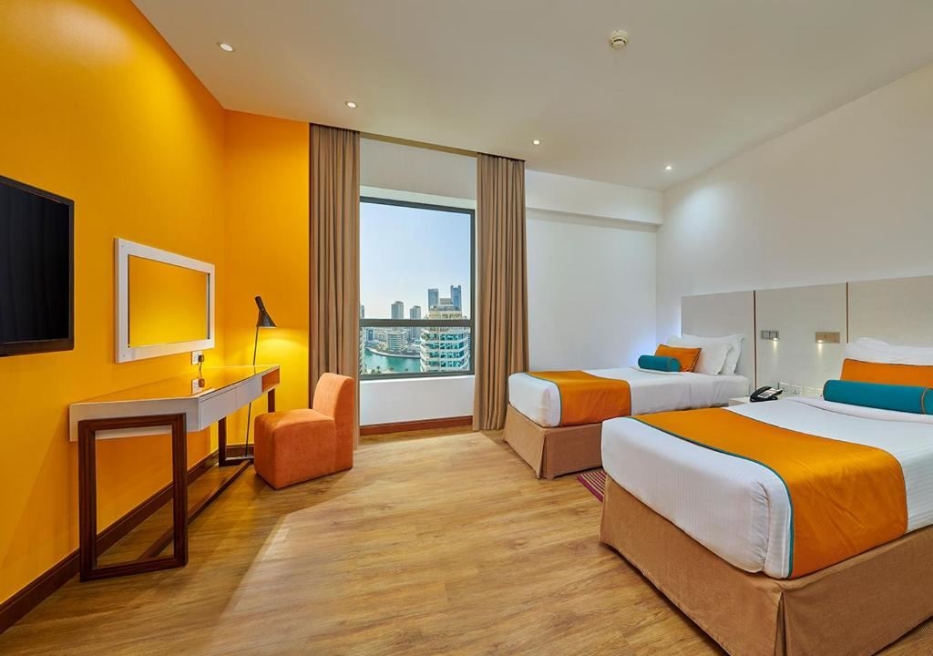 rooms-2bedroom-suite-balcony-city-view
