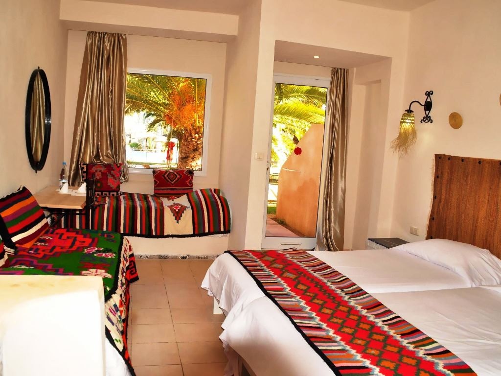rooms-quadruple-room-garden-view