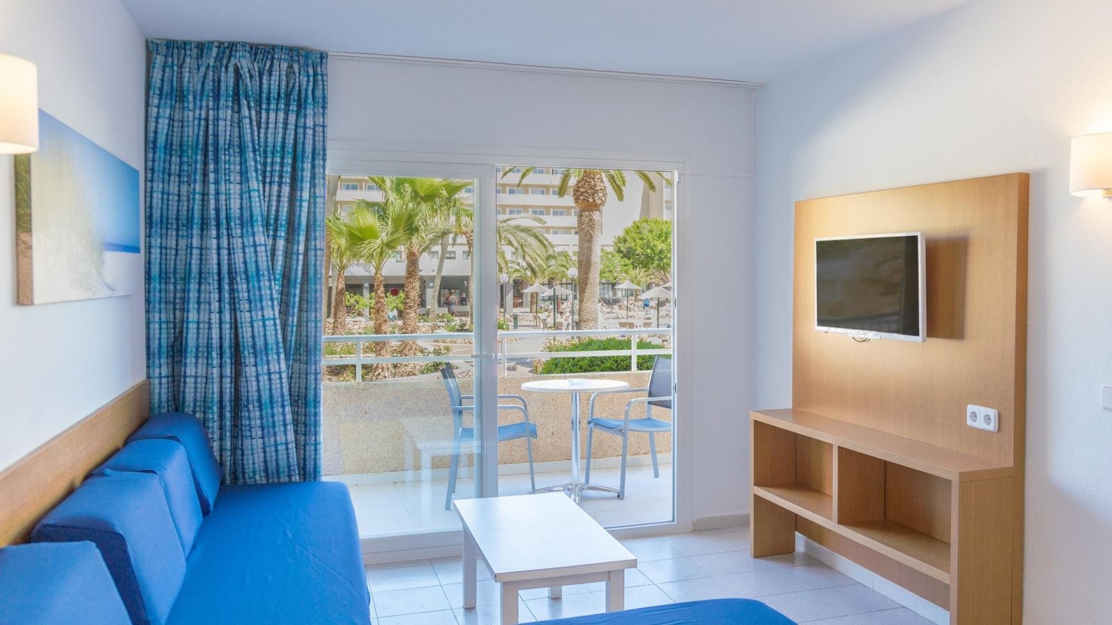 rooms-apartment-pool--garden-view-balcony-or-terrace