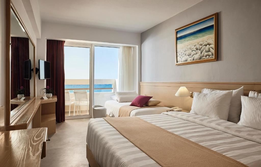 rooms-room-triple-seaview-balcony-or-terrace