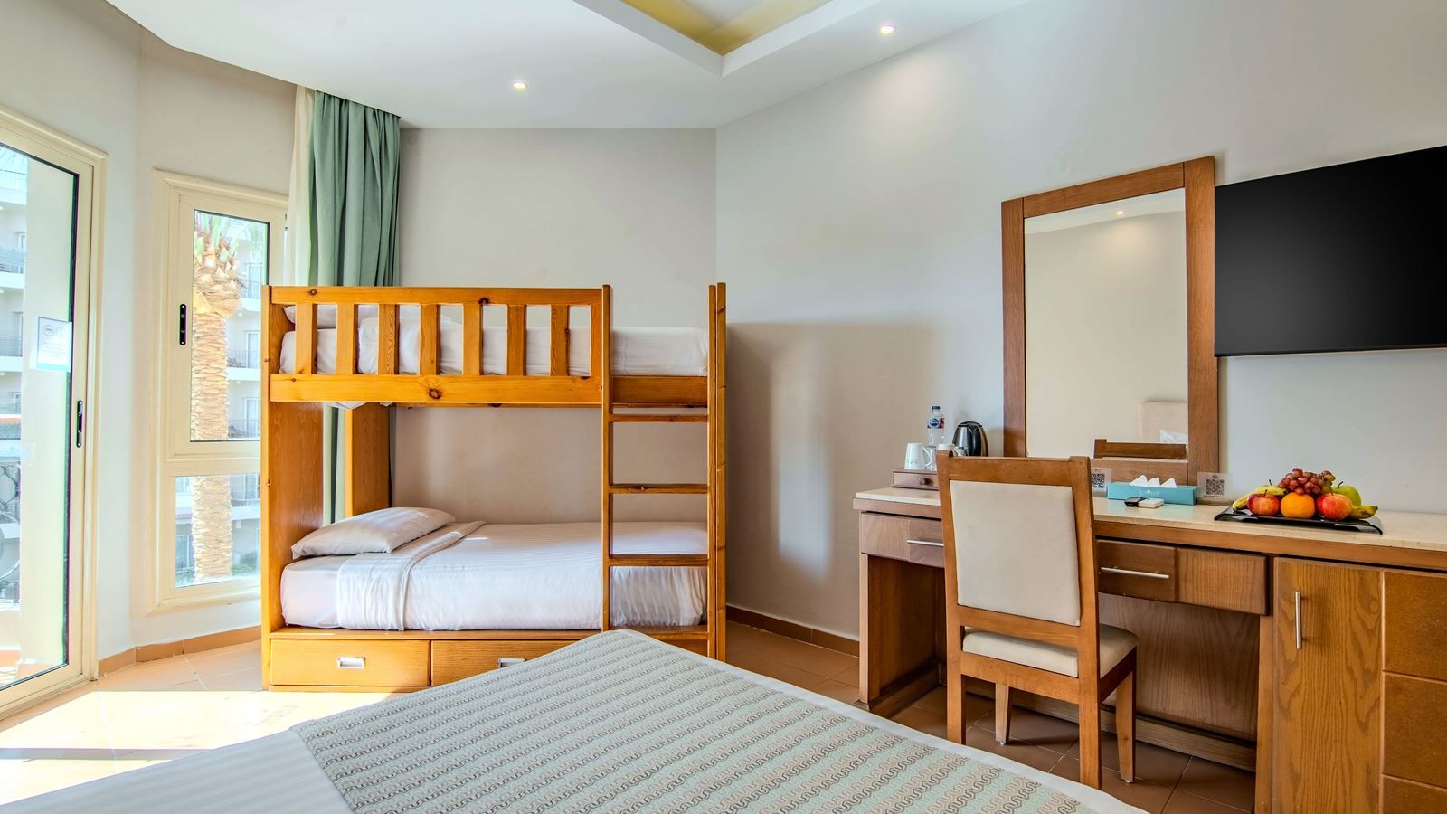 rooms-family-bunkbed-room-side-seabackgarden-view