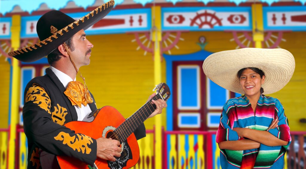 Mariachi i tradycyjna muzyka meksykańska prezentowana przez artystów w kolorowych strojach